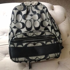 One zipper Coach backpack. I loved this backpack!